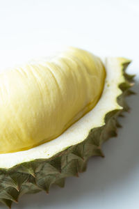 Close-up of bananas against white background