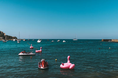 Scenic view of sea against clear blue sky