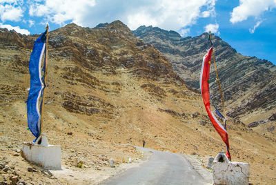 Multi colored flags by road