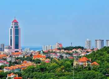 View of cityscape against clear sky