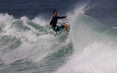 Man surfing in sea