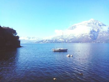 Scenic view of sea against blue sky