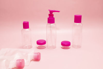 Close-up of bottles against white background
