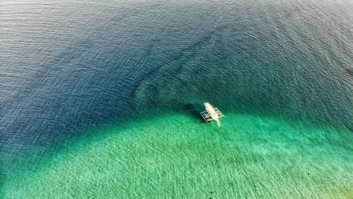 High angle view of sailboat on sea