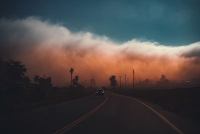 Road against sky during sunset