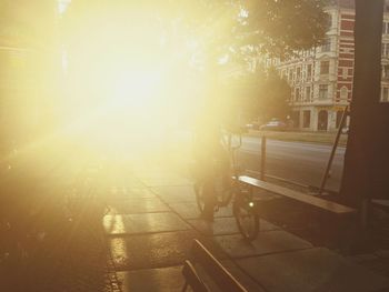 Sun shining through city