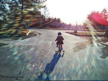 Woman walking on road