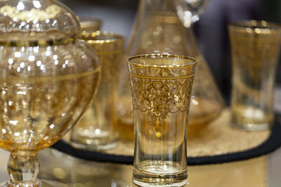 Close-up of beer glass on table