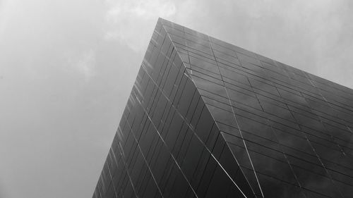 Low angle view of skyscraper against sky