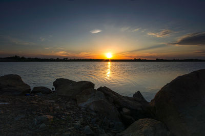 Scenic view of sea against sky during sunset