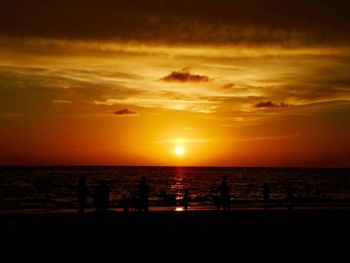 Scenic view of sea at sunset