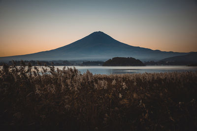 Scenic view of mountains against sky during sunset