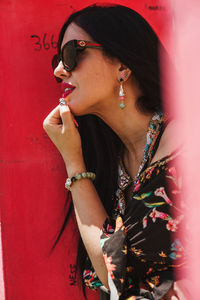 Portrait of young woman looking away