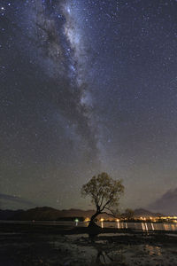 Scenic view of star field against sky at night