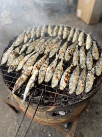 Close-up of fish on barbecue grill