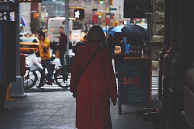 Woman standing at night