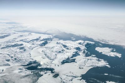 Scenic view of snow covered mountain against sky