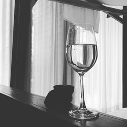 Close-up of wine glass on table