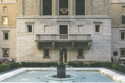 Vintage look of a sculpture on the courtyard of the mckim building of boston public library