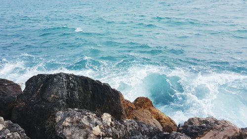 Waves splashing on rocks