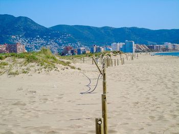 Scenic view of beach against clear sky