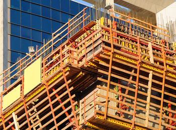 Low angle view of building against sky in city