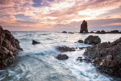 Scenic view of sea against sky during sunset