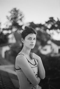 Portrait of woman standing outdoors