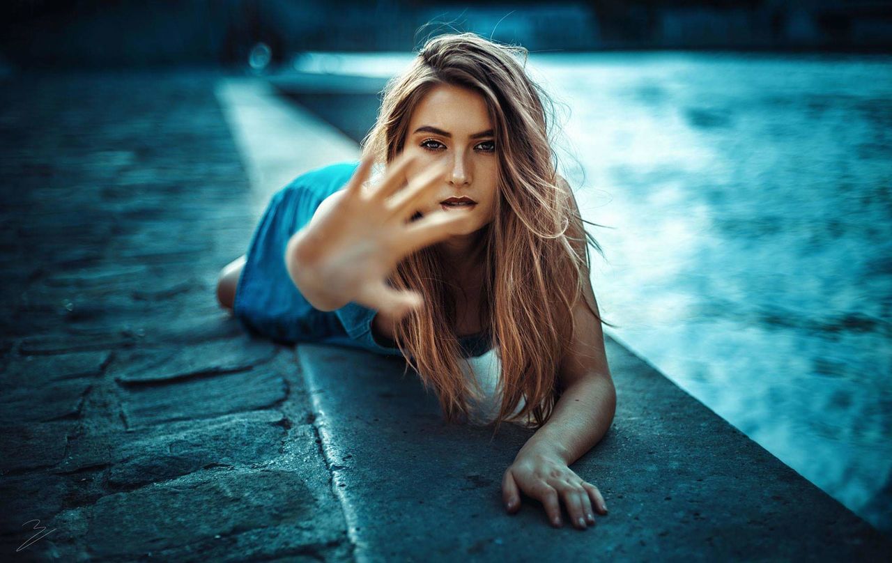 one person, young adult, women, hair, long hair, portrait, emotion, adult, sadness, young women, beauty, hairstyle, blond hair, beautiful woman, water, looking at camera, casual clothing, contemplation, swimming pool, hopelessness