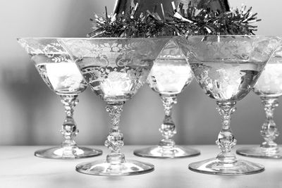 Close-up of martini glasses on table
