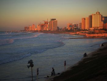 Scenic view of sea against clear sky during sunset