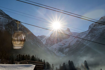 Scenic view of snowcapped mountains against sky during winter