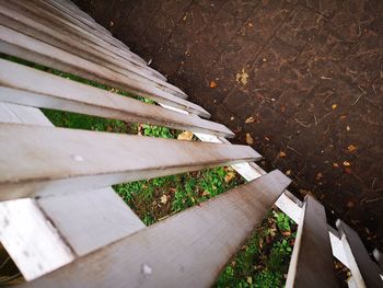 High angle view of wooden bench