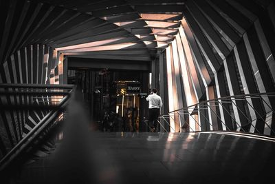 Man standing in corridor