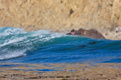 Portrait of person swimming in sea