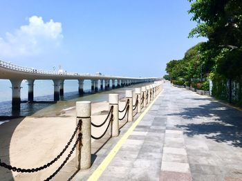 View of bridge against cloudy sky