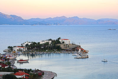 High angle view of sailboats in bay