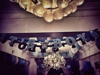 Low angle view of ornate hanging on ceiling