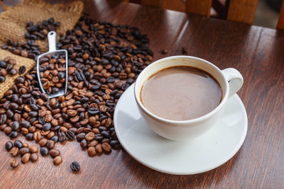 High angle view of coffee cup on table