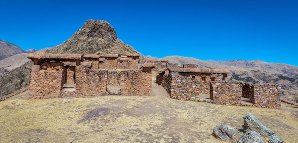 Old ruins against clear blue sky