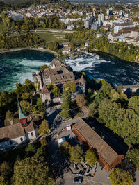 High angle view of town by sea