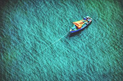 High angle view of boat sailing on sea