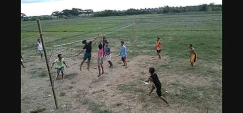 Group of people playing on field