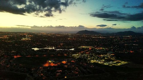 Aerial view of cityscape at night