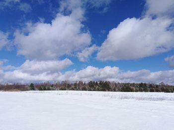 Scenic view of snow field against sky