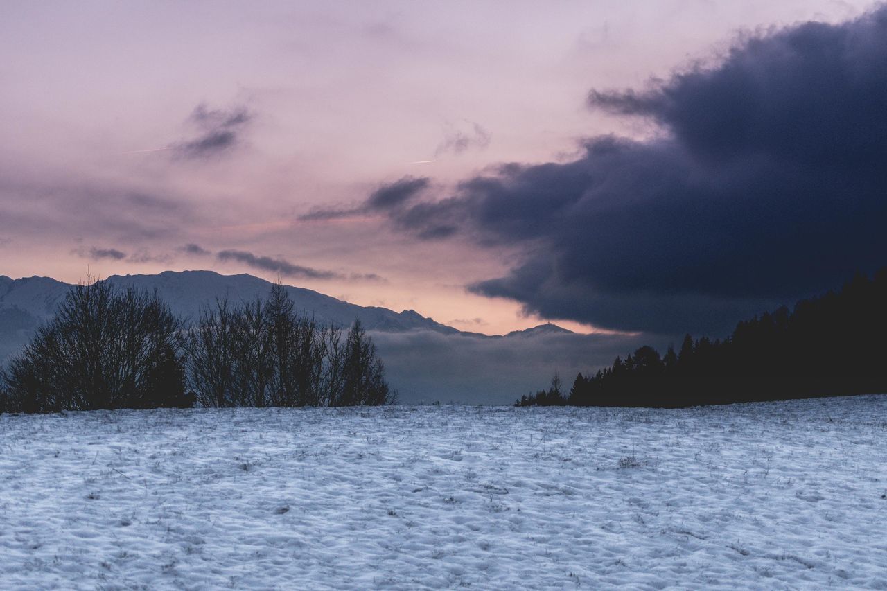 beauty in nature, nature, scenics, tranquility, tranquil scene, sky, sunset, outdoors, no people, cold temperature, cloud - sky, winter, waterfront, mountain, tree, snow, day, water