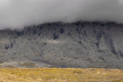 Scenic view of volcanic landscape against sky