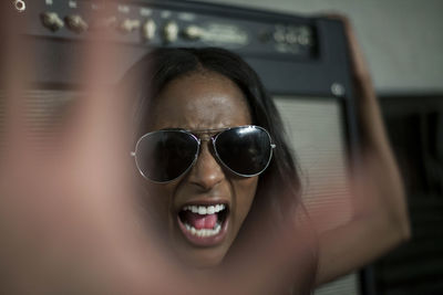 Portrait of woman wearing sunglasses