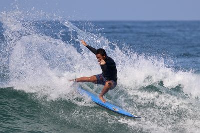 Man surfing in sea