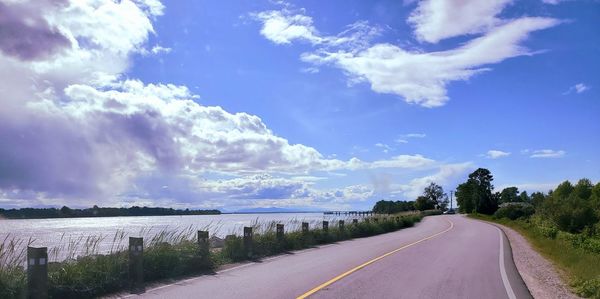 Empty road against sky